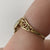 Diamond Heart Twist With XOX Accent Ring 10ct 10k Yellow Gold - Size N