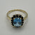 Blue Topaz & Sapphire Halo Cluster Ring 9ct 9k Yellow Gold - Size P 1/2