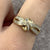 Diamond .10ct Baguette Twist Knot Crossover Ring 9ct Yellow Gold - Size N 1/2